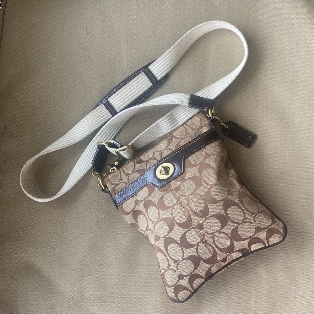 Coach Turn lock beige with brown trim Signature canvas Swing pack Crossbody bag